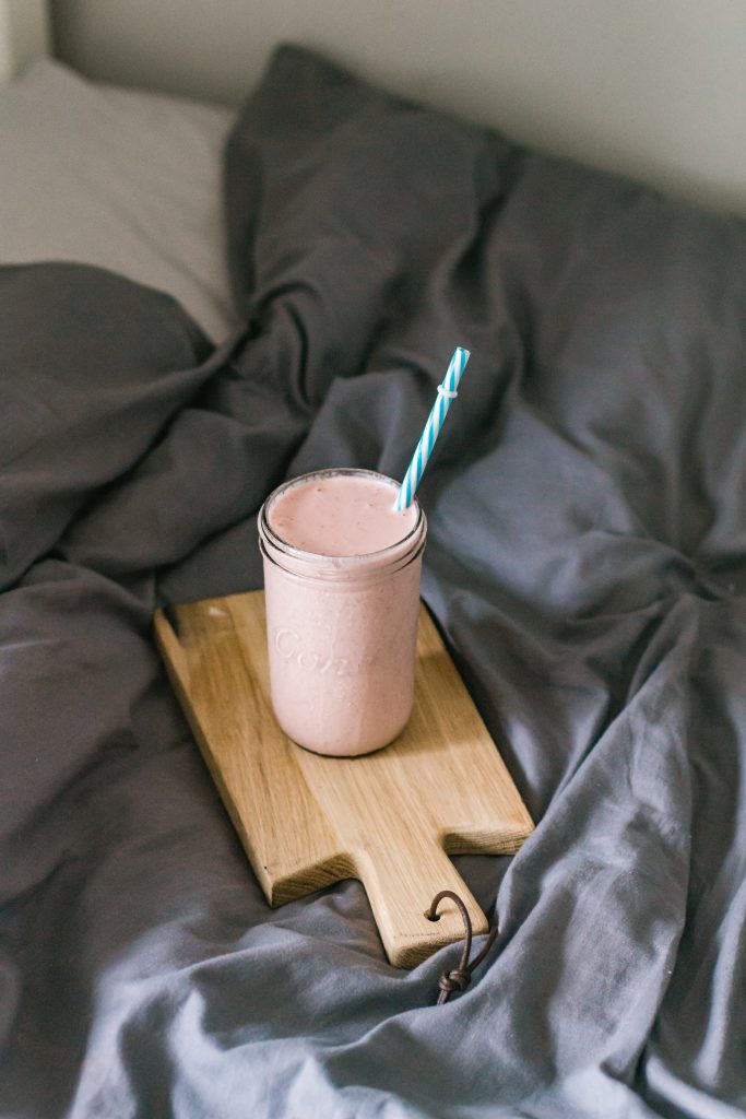 Pink Smoothie on a Cutting Board